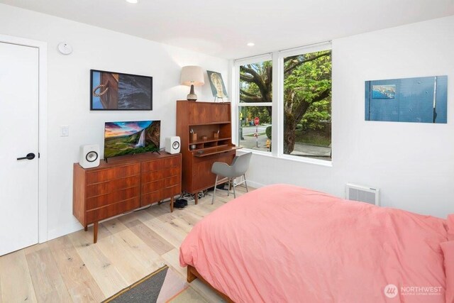 2305 E Alder St, Seattle, WA 98122 - bedroom featuring recessed lighting, baseboards, and wood finished floors