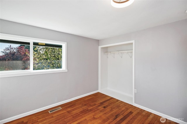 240 Willow St, Bremerton, WA 98310 - unfurnished bedroom featuring baseboards, wood finished floors, visible vents, and a closet