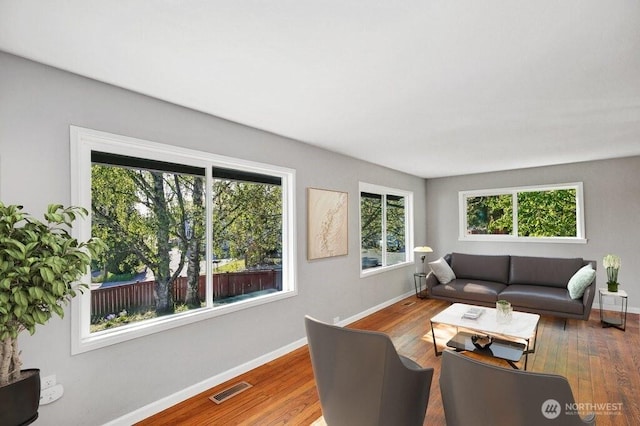 240 Willow St, Bremerton, WA 98310 - living room featuring wood finished floors, visible vents, and baseboards