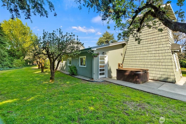 1812 N Pearl St, Centralia, WA 98531 - rear view of property with a lawn and a hot tub