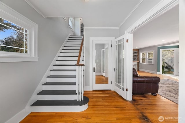 1812 N Pearl St, Centralia, WA 98531 - stairs with baseboards, french doors, wood finished floors, and ornamental molding