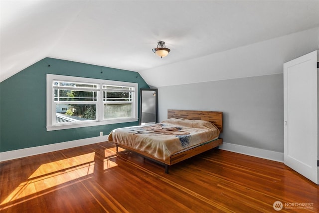 1812 N Pearl St, Centralia, WA 98531 - bedroom with lofted ceiling, wood finished floors, and baseboards