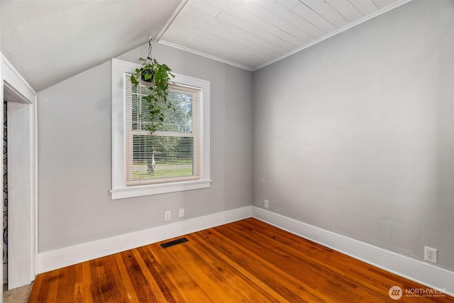 1812 N Pearl St, Centralia, WA 98531 - additional living space featuring baseboards, wood finished floors, visible vents, and vaulted ceiling
