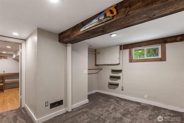 1812 N Pearl St, Centralia, WA 98531 - below grade area featuring visible vents, dark carpet, and baseboards
