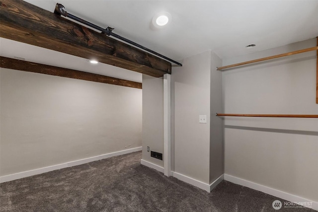 1812 N Pearl St, Centralia, WA 98531 - below grade area featuring baseboards and dark colored carpet