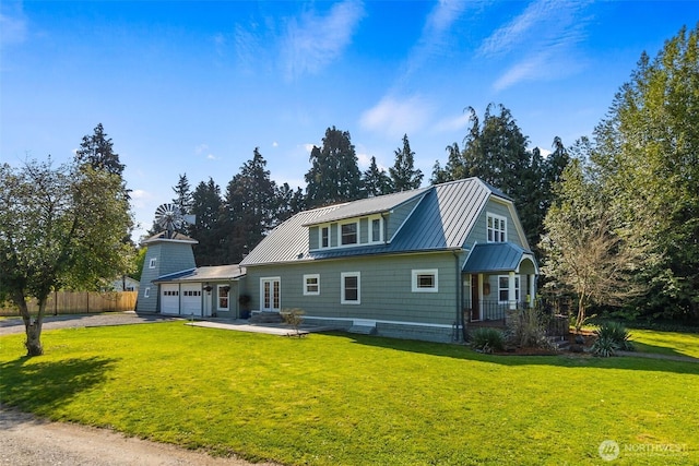 1812 N Pearl St, Centralia, WA 98531 - view of front of house featuring a garage, driveway, a front yard, and metal roof