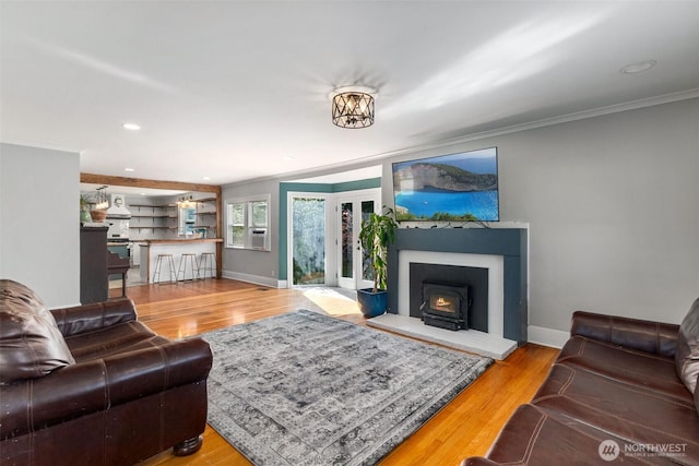1812 N Pearl St, Centralia, WA 98531 - living area with baseboards, wood finished floors, and crown molding