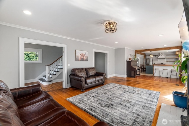 1812 N Pearl St, Centralia, WA 98531 - living room featuring recessed lighting, stairway, ornamental molding, and wood finished floors