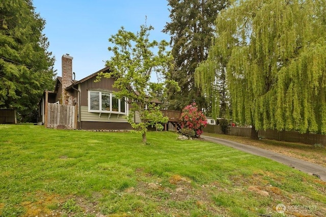 view of yard with fence
