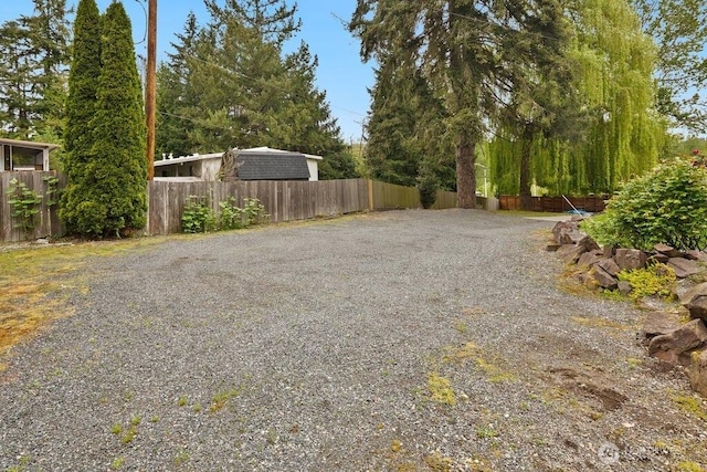 view of yard with fence