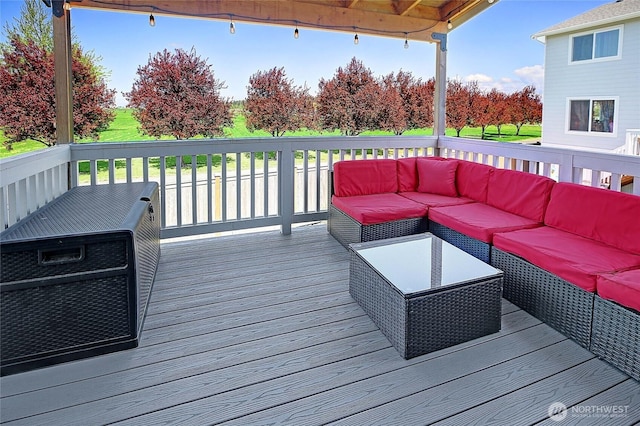 wooden terrace featuring an outdoor hangout area
