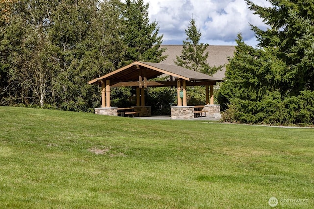 view of community with a yard and a gazebo