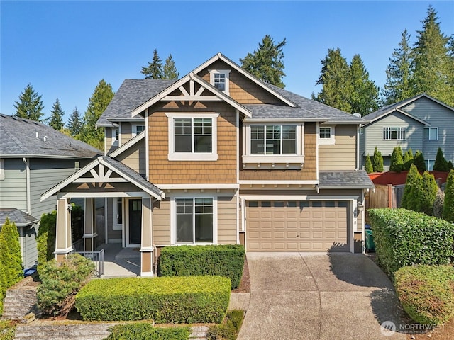 13218 106th Pl NE, Kirkland, WA 98034 - craftsman-style home featuring a garage, roof with shingles, and concrete driveway
