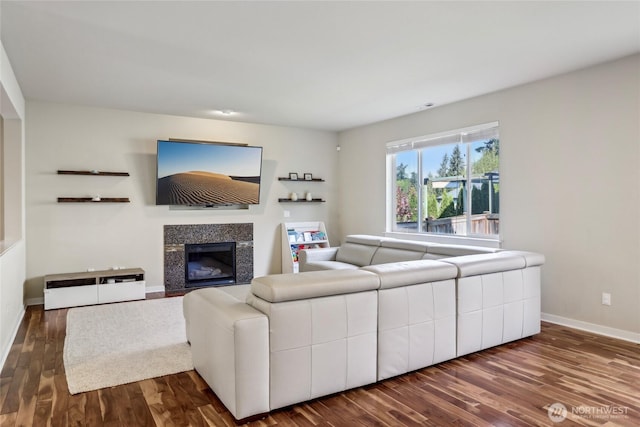 13218 106th Pl NE, Kirkland, WA 98034 - living room featuring dark wood-type flooring, baseboards, and a tile fireplace