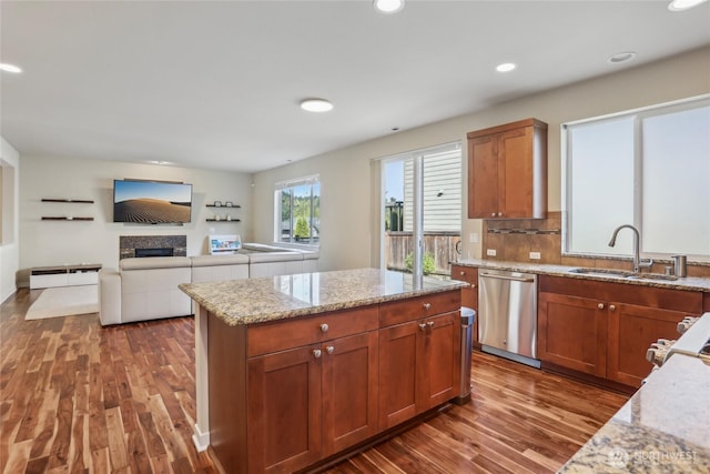 13218 106th Pl NE, Kirkland, WA 98034 - kitchen with wood finished floors, a sink, dishwasher, and a fireplace
