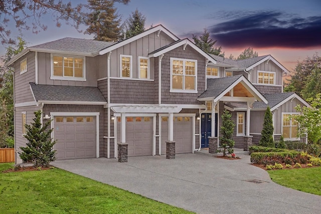 14835 NE 11th Pl, Bellevue, WA 98007 - view of front of home with a garage, concrete driveway, board and batten siding, and a shingled roof