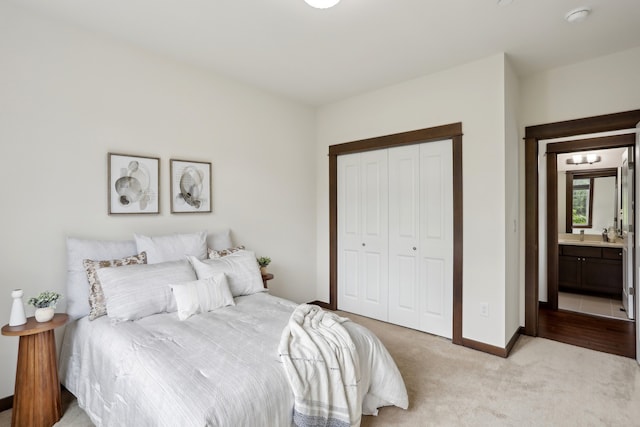 14835 NE 11th Pl, Bellevue, WA 98007 - bedroom with light colored carpet, a closet, and baseboards