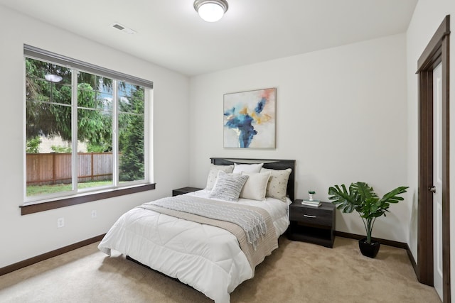 14835 NE 11th Pl, Bellevue, WA 98007 - bedroom with light colored carpet and baseboards