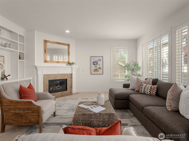 1206 S 36th Pl, Renton, WA 98055 - living room featuring a fireplace, recessed lighting, built in shelves, and baseboards