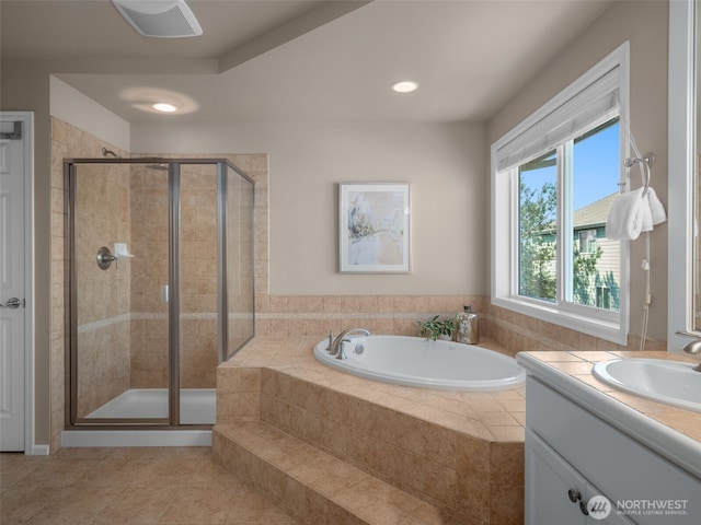 1206 S 36th Pl, Renton, WA 98055 - full bath featuring a stall shower, tile patterned floors, a garden tub, vanity, and recessed lighting