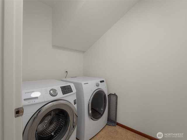 1206 S 36th Pl, Renton, WA 98055 - laundry area featuring washer and dryer, baseboards, and light tile patterned floors
