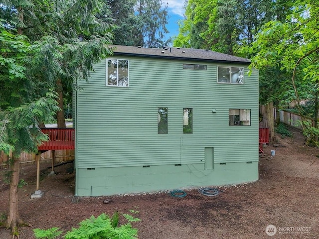 21827 4th Ave SE, Bothell, WA 98021 - view of property exterior featuring crawl space and fence