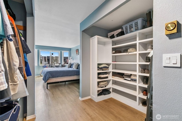 6910 California Ave SW Unit 26, Seattle, WA 98136 - interior space featuring baseboards and wood finished floors