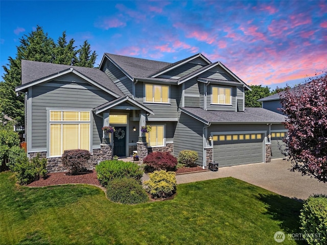 13211 174th St E, Puyallup, WA 98374 - craftsman inspired home featuring stone siding, a front lawn, concrete driveway, and a garage
