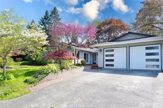 604 128th Ave SE, Bellevue, WA 98005 - single story home with aphalt driveway and an attached garage