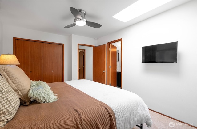 604 128th Ave SE, Bellevue, WA 98005 - bedroom with ceiling fan, baseboards, carpet flooring, and a closet