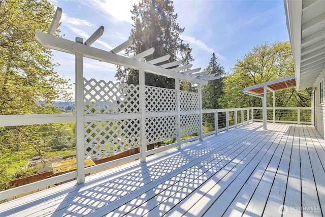 wooden deck with a pergola