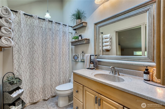 bathroom with a shower with shower curtain, toilet, tile patterned flooring, and vanity