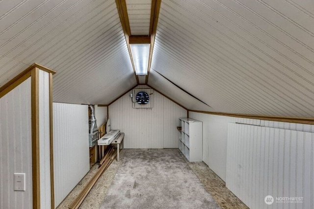 bonus room featuring light colored carpet and lofted ceiling