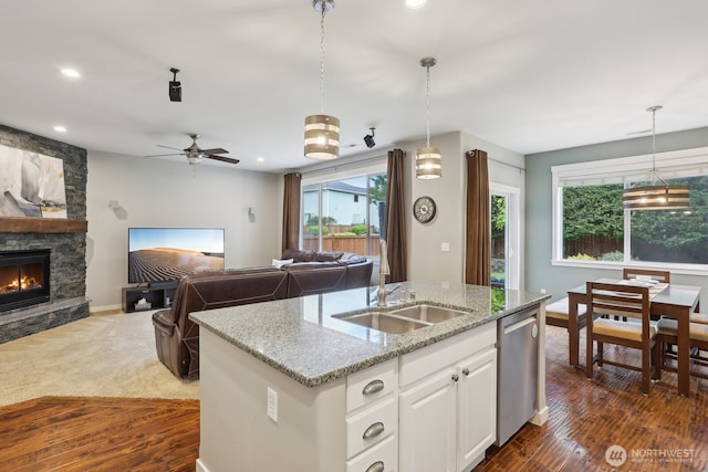 25510 SE 275th Pl, Maple Valley, WA 98038 - kitchen with dishwasher, a sink, a center island with sink, open floor plan, and recessed lighting