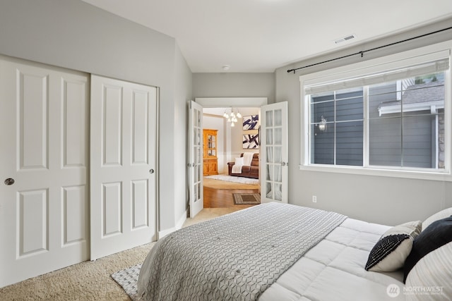 25510 SE 275th Pl, Maple Valley, WA 98038 - carpeted bedroom with a chandelier and a closet