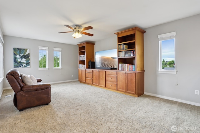25510 SE 275th Pl, Maple Valley, WA 98038 - living room featuring baseboards, light carpet, and a ceiling fan