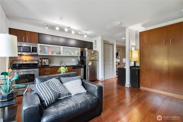 4547 8th Ave NE Unit 308, Seattle, WA 98105 - living area with dark wood-type flooring