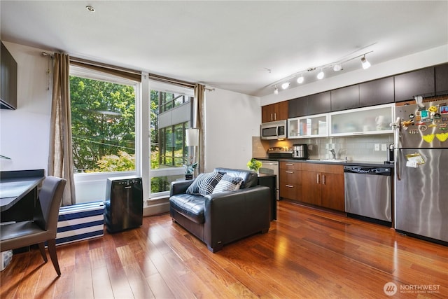 4547 8th Ave NE Unit 308, Seattle, WA 98105 - interior space with dark wood-style floors