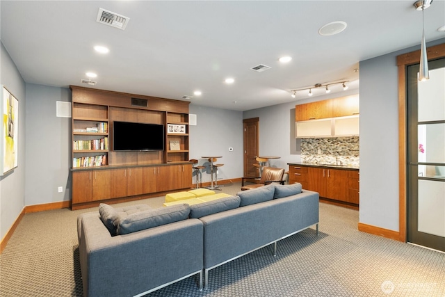 4547 8th Ave NE Unit 308, Seattle, WA 98105 - living area featuring visible vents and baseboards