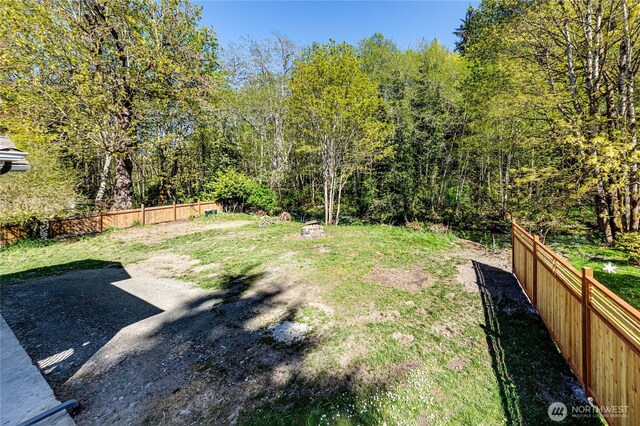view of yard featuring a fenced backyard