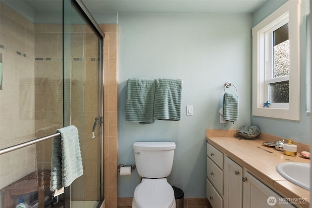 192 Fay Ln, Camano Island, WA 98282 - bathroom featuring vanity, a stall shower, and toilet