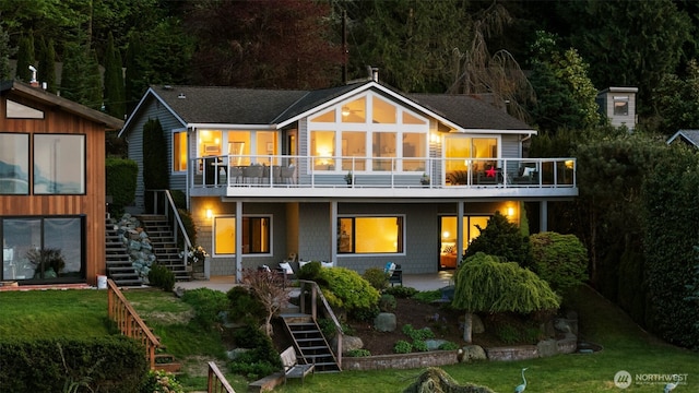 192 Fay Ln, Camano Island, WA 98282 - rear view of property with stairs and a lawn