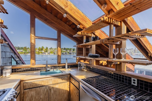 3123 Fairview Ave E Unit 2, Seattle, WA 98102 - view of patio featuring a sink, a water view, and a boat dock