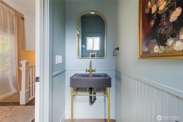 421 Malden Ave E, Seattle, WA 98112 - bathroom with wainscoting and a sink