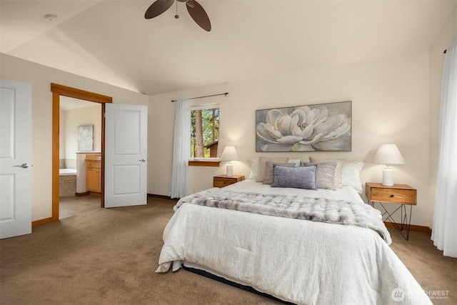 bedroom featuring baseboards, carpet flooring, connected bathroom, and lofted ceiling