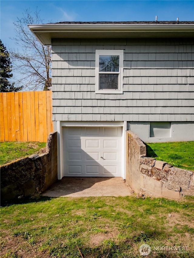 garage with fence