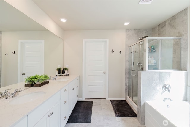 full bathroom featuring double vanity, a sink, a bath, and a stall shower