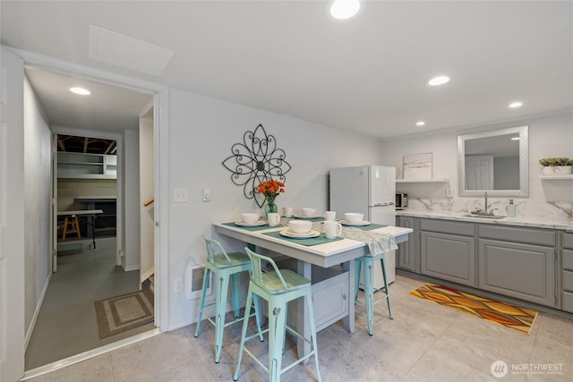 dining area with stairway, baseboards, and recessed lighting