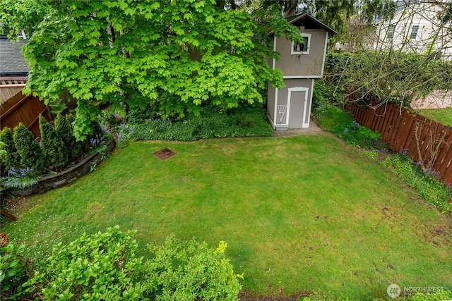 view of yard with a fenced backyard