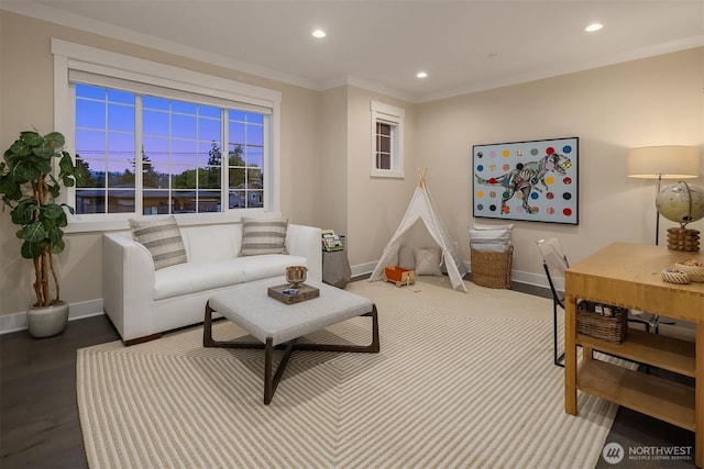 living area with baseboards, recessed lighting, and ornamental molding